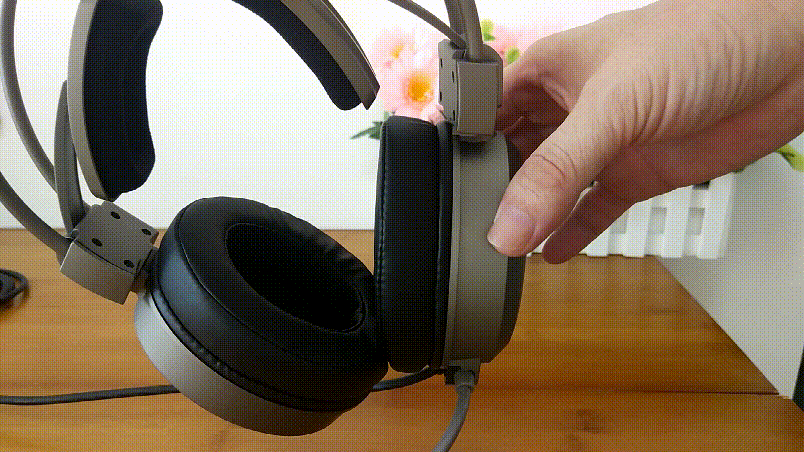 飞翼式头戴的雷柏VH610虚拟7.1声道游戏耳机_新浪众测